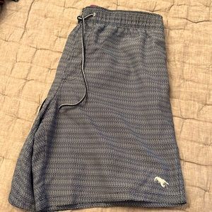 Stylish swim trunks with mesh lining.  Size 5